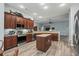 The kitchen features stainless steel appliances, hardwood floors, and ample countertop space at 621 Elgin Ct., Myrtle Beach, SC 29579