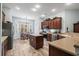 The kitchen features stainless steel appliances, a breakfast nook, hardwood floors, and ample countertop space at 621 Elgin Ct., Myrtle Beach, SC 29579