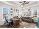 Comfortable living room with a desk area, wood floors and lots of natural light at 621 Elgin Ct., Myrtle Beach, SC 29579