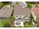 Aerial view of the home showcasing a private backyard patio and manicured landscaping at 1002 Summers Pl., North Myrtle Beach, SC 29582