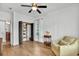 Bright bedroom featuring wood floors, recessed lighting, and a closet with open shelving at 1002 Summers Pl., North Myrtle Beach, SC 29582