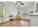 Bedroom with hardwood floors, white walls, and plenty of natural light from the windows at 1002 Summers Pl., North Myrtle Beach, SC 29582