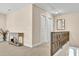 Upstairs landing with view of stairs and featuring carpet floors and neutral walls at 1002 Summers Pl., North Myrtle Beach, SC 29582