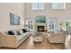 Inviting living room featuring a fireplace, comfortable seating, and plenty of natural light at 1002 Summers Pl., North Myrtle Beach, SC 29582