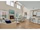 Bright and airy living room with high ceilings, fireplace, and modern furnishings at 1002 Summers Pl., North Myrtle Beach, SC 29582