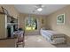 Comfortable bedroom with desk space and window views at 1562 Hawthorn Dr., Pawleys Island, SC 29585