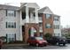 Apartment exterior features a brick and siding facade, covered entry, and green shutters at 3762 Citation Way # 1016, Myrtle Beach, SC 29577