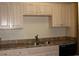 The kitchen features stainless steel sink, laminate countertops and neutral cabinets at 3762 Citation Way # 1016, Myrtle Beach, SC 29577