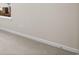 View of a neutral wall and carpet flooring in a vacant room at 5028 Cambria Ct., Little River, SC 29566