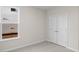 Vacant room featuring neutral wall paint, carpet flooring, and a window with a view of the outdoors at 5028 Cambria Ct., Little River, SC 29566