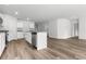 New kitchen features stainless steel appliances, granite counters, and white cabinets at 1126 Cherrystone Loop, Conway, SC 29526