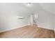 Spacious bedroom with light wood floors, mini-split AC unit, and ample natural light at 2612 Old Charleston Rd., Georgetown, SC 29440