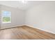 Bright bedroom featuring hard wood floors, a neutral color scheme, and lots of natural light at 2612 Old Charleston Rd., Georgetown, SC 29440