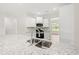 Modern kitchen featuring stainless steel appliances, granite countertops, and white cabinetry at 2612 Old Charleston Rd., Georgetown, SC 29440