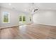 Spacious living room featuring wood-look floors, natural light and a sliding glass door at 2612 Old Charleston Rd., Georgetown, SC 29440