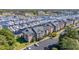 Aerial view of condo building near marina and parking at 4633 Lightkeepers Way # 5-J, Little River, SC 29566