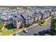Aerial view of condo building with parking and marina at 4633 Lightkeepers Way # 5-J, Little River, SC 29566
