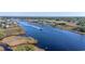 Aerial view of boat traveling on waterway near waterfront homes at 4633 Lightkeepers Way # 5-J, Little River, SC 29566