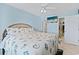 Spacious bedroom with a queen bed and walk-in closet at 4633 Lightkeepers Way # 5-J, Little River, SC 29566