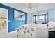 Bedroom with queen bed, and blue-themed decor at 4633 Lightkeepers Way # 5-J, Little River, SC 29566