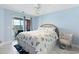 Bedroom with a queen bed and access to balcony at 4633 Lightkeepers Way # 5-J, Little River, SC 29566