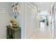 Condo hallway with tile floors and coat closet at 4633 Lightkeepers Way # 5-J, Little River, SC 29566