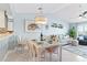 Living room features a sofa, chairs, and coastal decor at 4633 Lightkeepers Way # 5-J, Little River, SC 29566