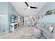 Bright living room with open floor plan, fireplace, and adjacent dining area at 4633 Lightkeepers Way # 5-J, Little River, SC 29566