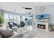 Relaxing living area with fireplace and water views at 4633 Lightkeepers Way # 5-J, Little River, SC 29566