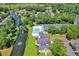 Aerial view of the community pool, tennis courts, and community buildings at 89 Gleneagle Ln., Pawleys Island, SC 29585