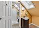 Bathroom featuring a stand-up shower, skylight, and dark vanity at 89 Gleneagle Ln., Pawleys Island, SC 29585