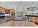 Gourmet kitchen with a center island, granite countertops, and stainless steel appliances at 89 Gleneagle Ln., Pawleys Island, SC 29585