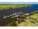 Aerial view of a private marina with multiple boat slips and access to a river at 89 Gleneagle Ln., Pawleys Island, SC 29585