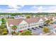 Community view showcasing building with ample parking at 117 Butkus Dr. # 3, Myrtle Beach, SC 29588