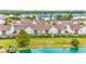 Aerial view of townhouse community near pond at 117 Butkus Dr. # 3, Myrtle Beach, SC 29588