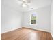 Spacious bedroom with hardwood floors and a window at 117 Butkus Dr. # 3, Myrtle Beach, SC 29588