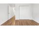 Well-lit bedroom featuring hardwood floors and a closet at 117 Butkus Dr. # 3, Myrtle Beach, SC 29588