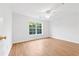 Bright bedroom with wood floors and ceiling fan at 117 Butkus Dr. # 3, Myrtle Beach, SC 29588