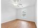 Spacious bedroom with hardwood floors and a large window at 117 Butkus Dr. # 3, Myrtle Beach, SC 29588