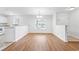 Simple dining area with wood floors and kitchen access at 117 Butkus Dr. # 3, Myrtle Beach, SC 29588