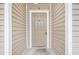 Tan front door entry to a condo unit at 117 Butkus Dr. # 3, Myrtle Beach, SC 29588