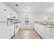 White kitchen with appliances and tile floors at 117 Butkus Dr. # 3, Myrtle Beach, SC 29588