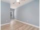 Well-lit bedroom featuring wood-look floors, ceiling fan, and a single window at 2073 Silver Crest Dr. # 4 D, Myrtle Beach, SC 29579
