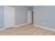 Light and airy bedroom with stylish wood-look flooring and a fresh coat of paint at 2073 Silver Crest Dr. # 4 D, Myrtle Beach, SC 29579