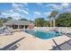 Community pool surrounded by palm trees offers a relaxing outdoor space at 2073 Silver Crest Dr. # 4 D, Myrtle Beach, SC 29579