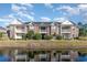 Brick condos with balconies overlooking a pond highlight the community's charm at 2073 Silver Crest Dr. # 4 D, Myrtle Beach, SC 29579