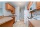 Charming kitchen featuring light-colored cabinets, laminate countertops, and white appliances at 2073 Silver Crest Dr. # 4 D, Myrtle Beach, SC 29579