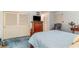 Bright bedroom with a large closet, wood furniture, and soft blue accents at 2807 Graham Rd., Conway, SC 29526