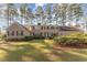 Beautiful two-story brick home with well-maintained lawn and mature landscaping at 2807 Graham Rd., Conway, SC 29526
