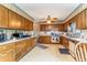 Full kitchen with wooden cabinetry, countertop space and lots of natural light at 2807 Graham Rd., Conway, SC 29526